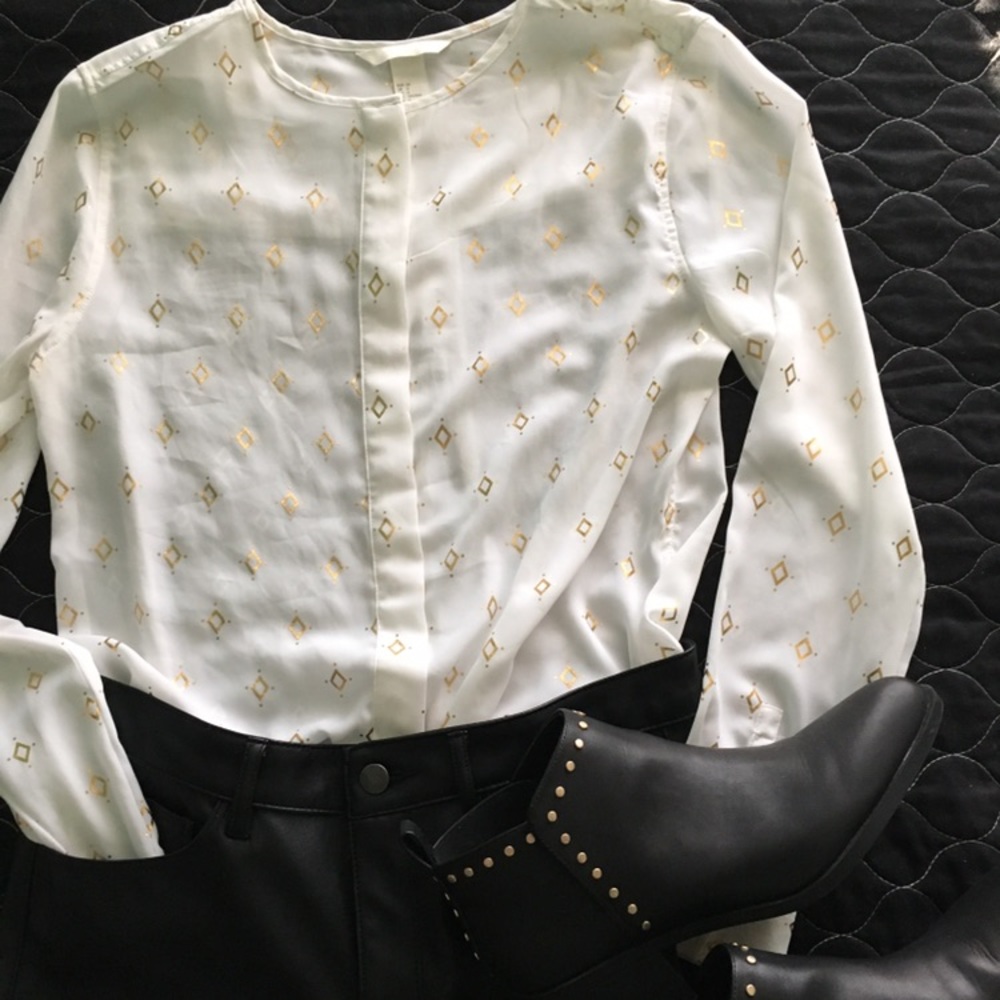 Gold a white blouse