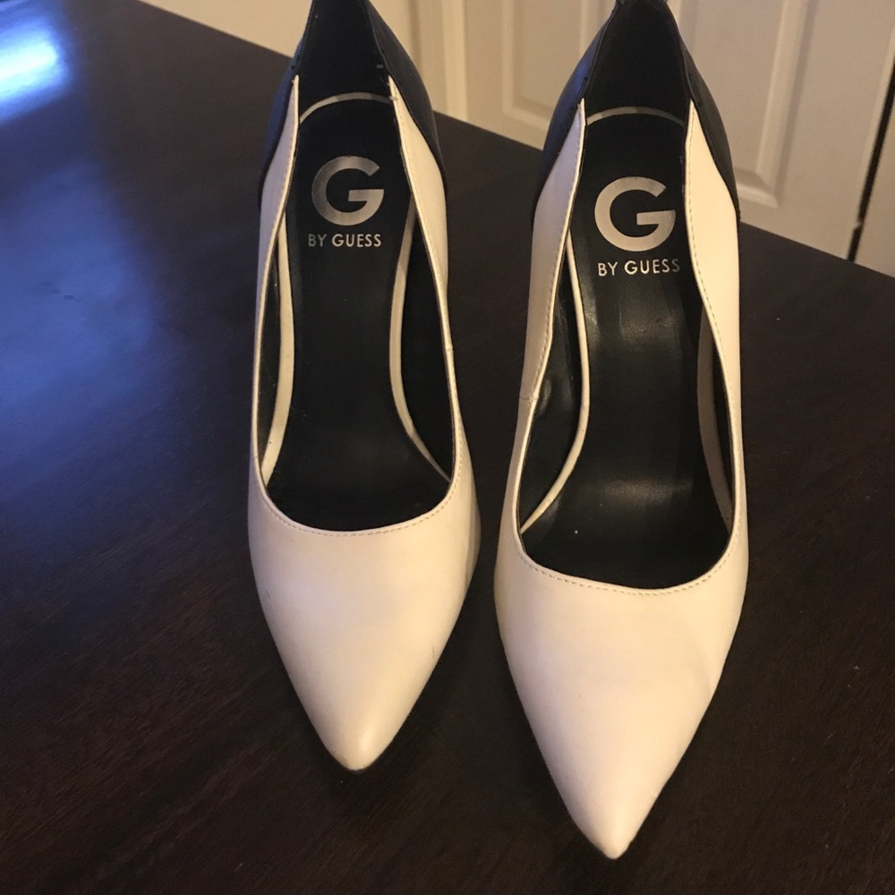 Brand new pair of Guess white/black high heels