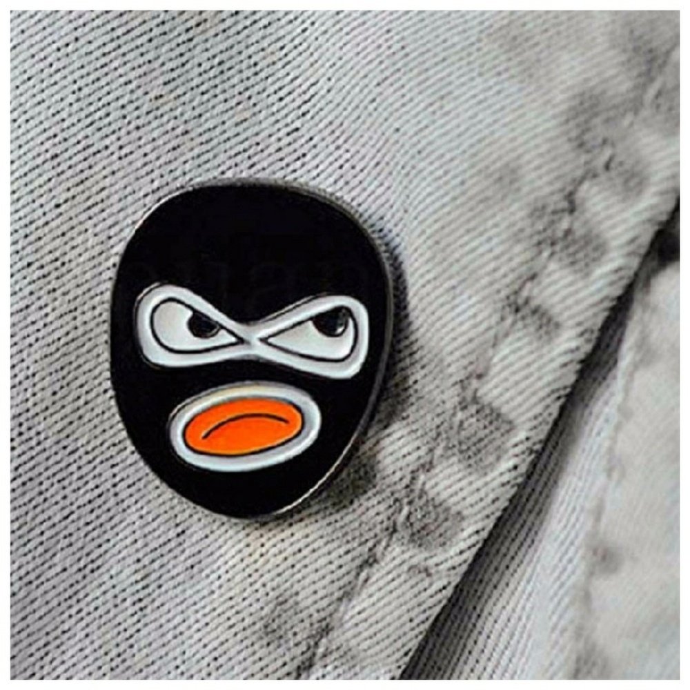 5 for $25. Cute cartoon brooches robber