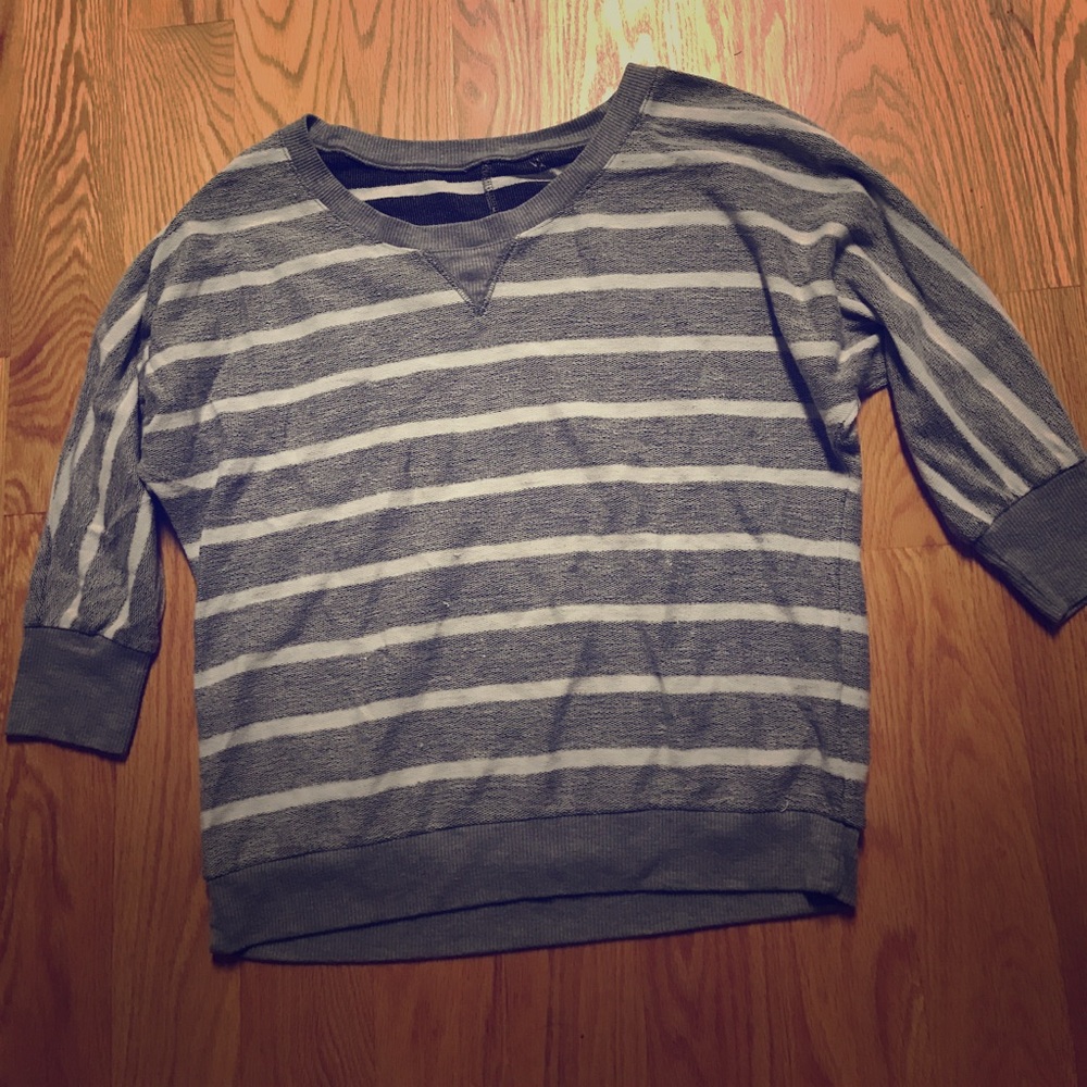 Grey striped sweater.