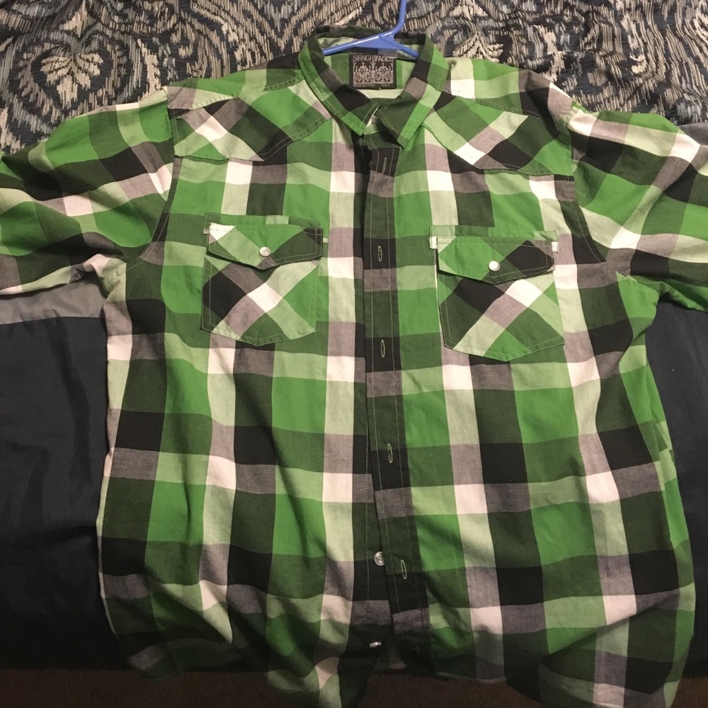 Long sleeve flannel button down shirt.