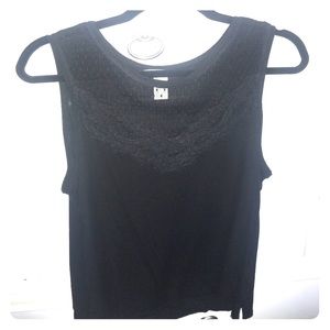Black lace sleeveless shirt.