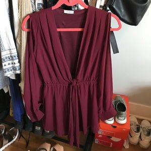 Maroon romper low cut with middle bow