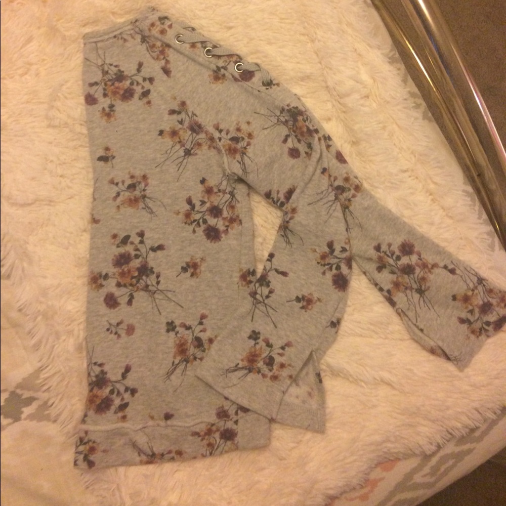 Edgy distressed floral sweater