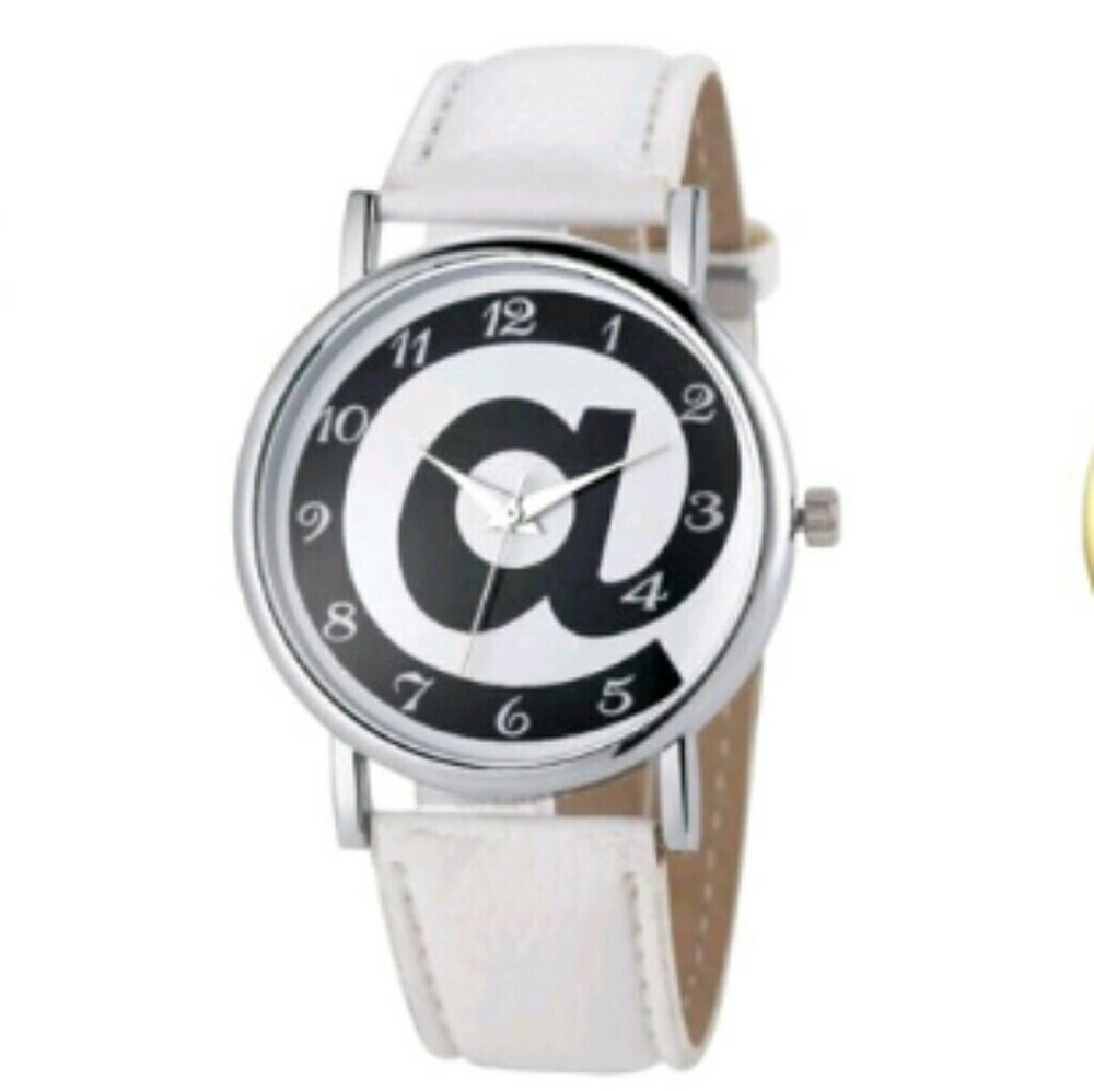 @ Watch with white faux leather band