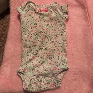 White preemie onesie with flowers and owls