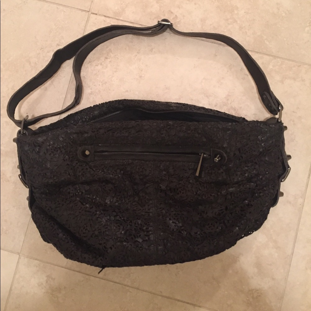 Brown lace cut out leather messenger bag
