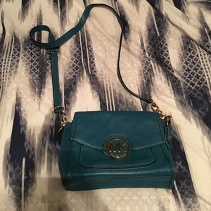Teal with gold accents, crossbody bag!