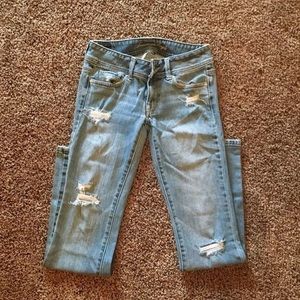 Distressed AE Bootcut Jeans