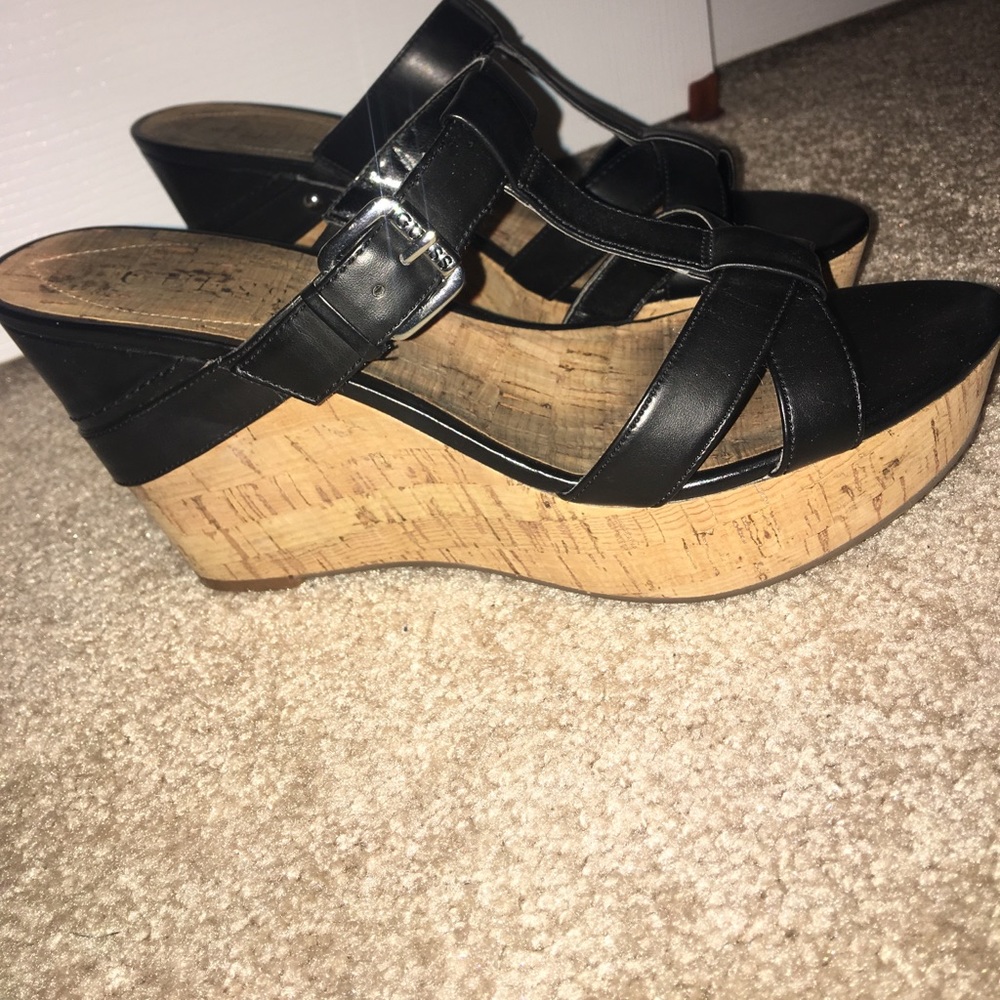 Black and brown Guess wedges