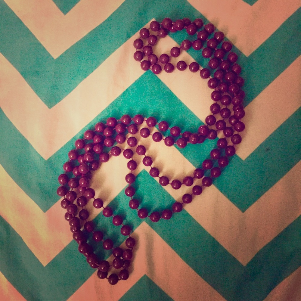 Plum Colored Bead Strand