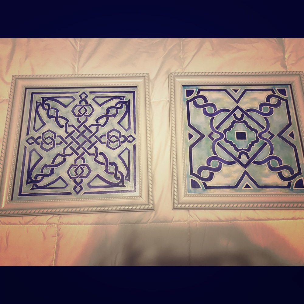 Three picture frames with pictures