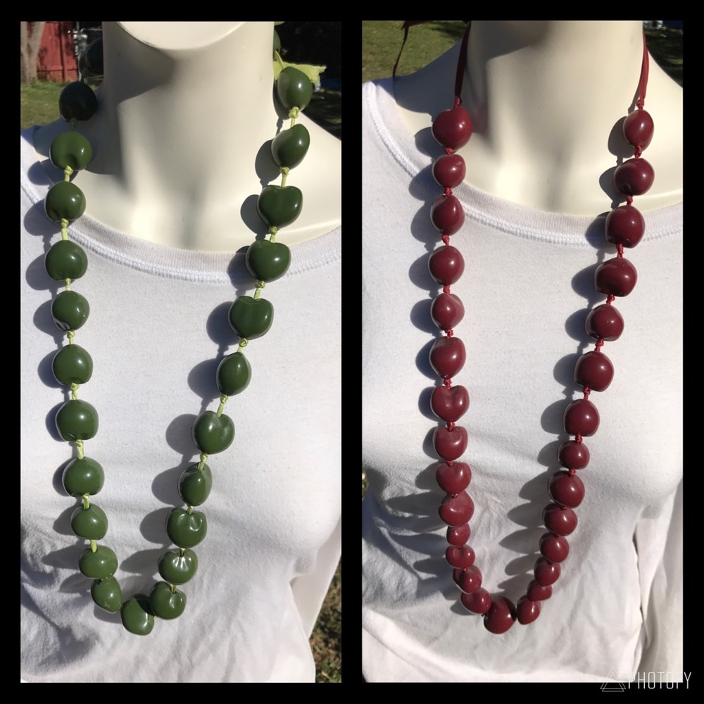 Necklace with large beads threaded on ribbon