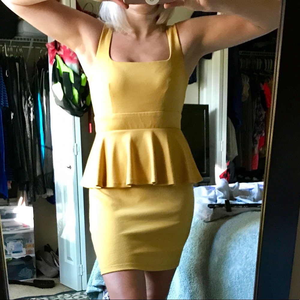 BCX Mustard colored peplum dress.