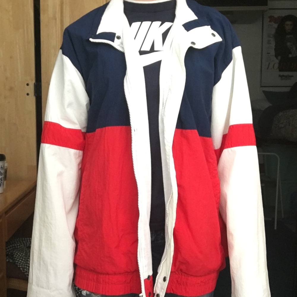 red, white, and blue windbreaker