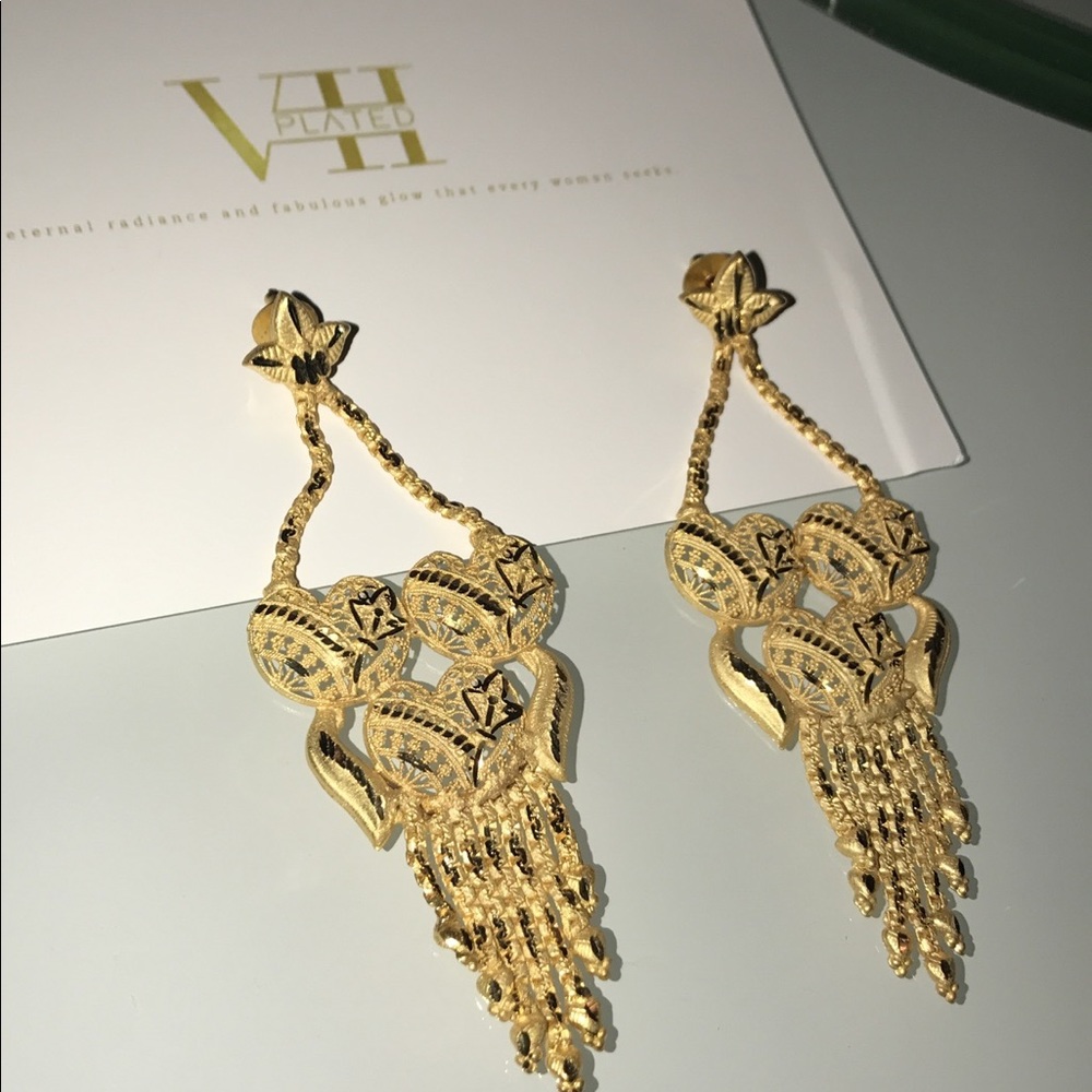 Seven Plated Gold Earrings