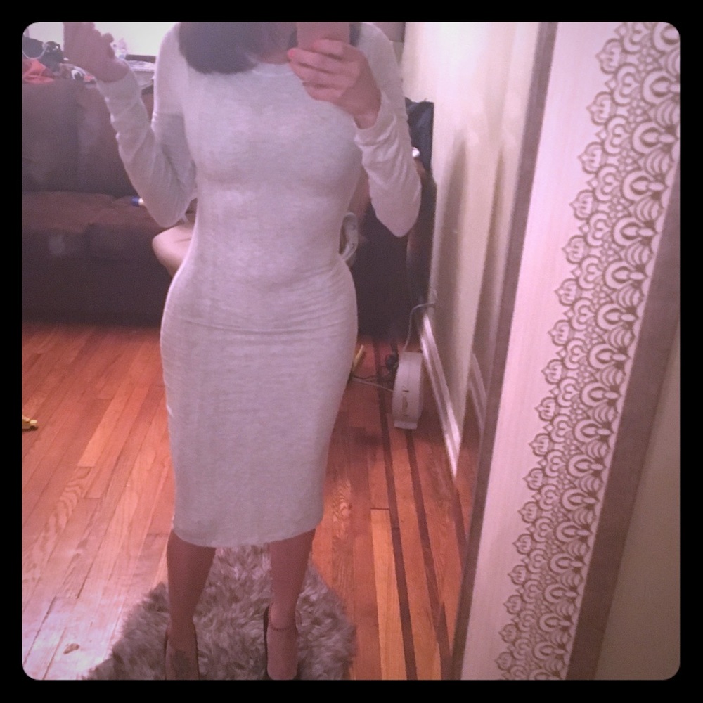 Long sleeve midi dress hugs all curves