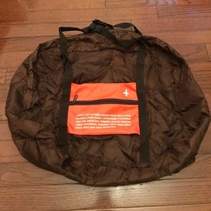 Happy flight pocketable tote