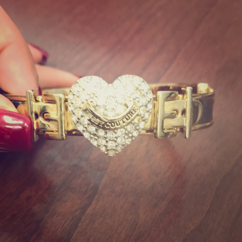 Leather strap juicy couture bangle.
