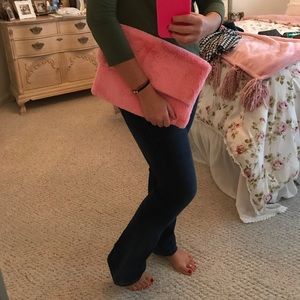 Over sized faux fur pink clutch