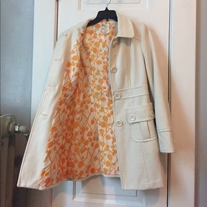 Feminine-cut white winter wool coat