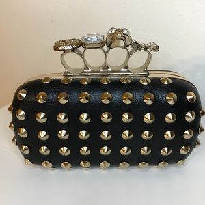 Natasha Couture Black Skull Studded Knuckle Clutch
