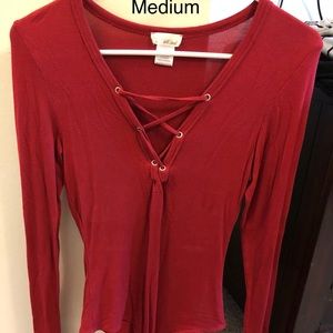 Women’s v-neck long sleeve lace-up front bodysuit