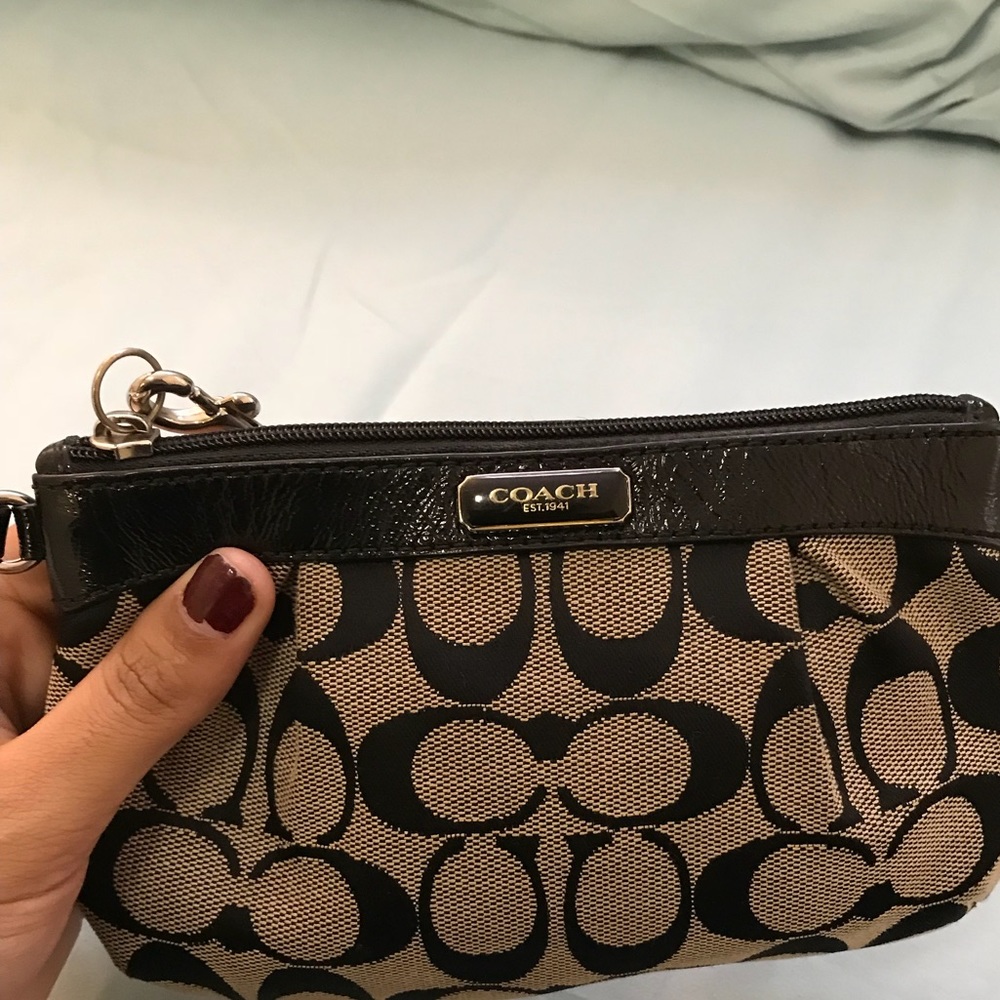 Classic gray and black Coach wristlet