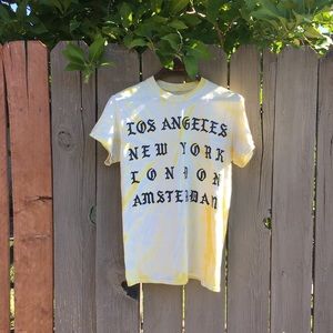 Yellow Tie Dye tee w/Old English Script.