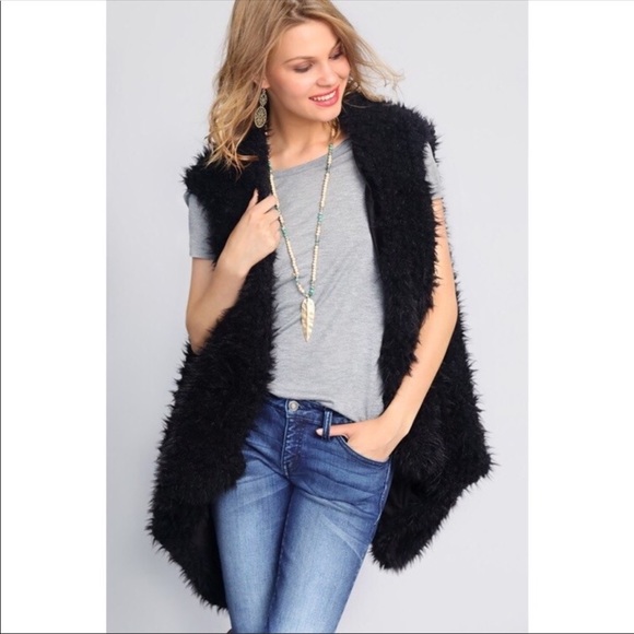 black fuzzy vest