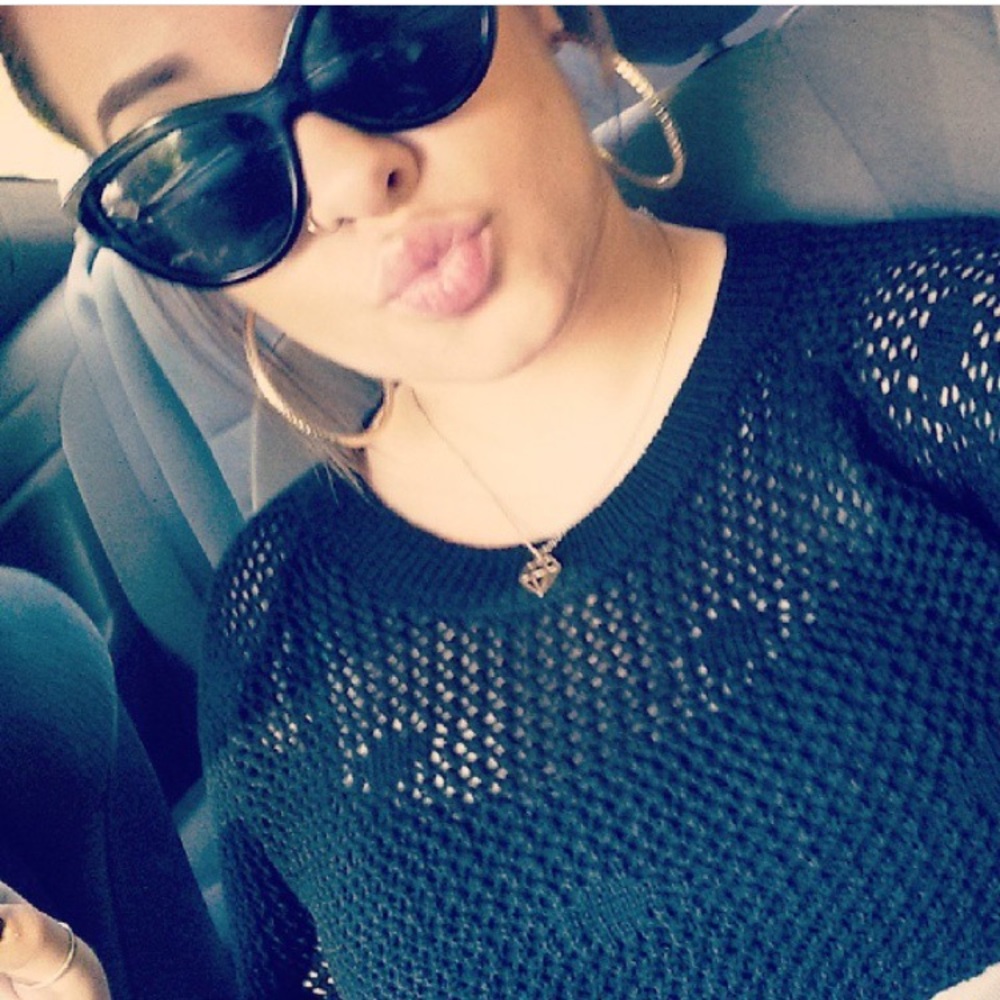 Black knitted sweater with subtle detail