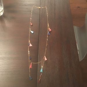 Dainty gold necklace with colored tassels