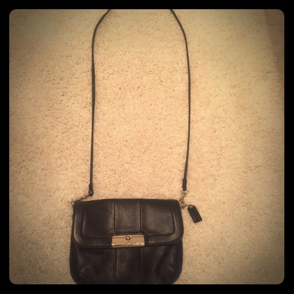 Authentic fold over black leather Coach crossbody