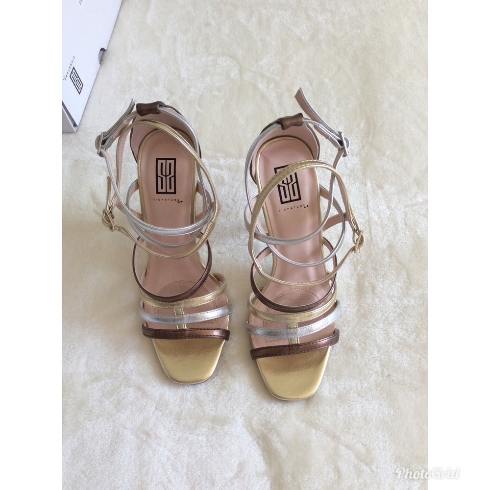 Gold strapped heels