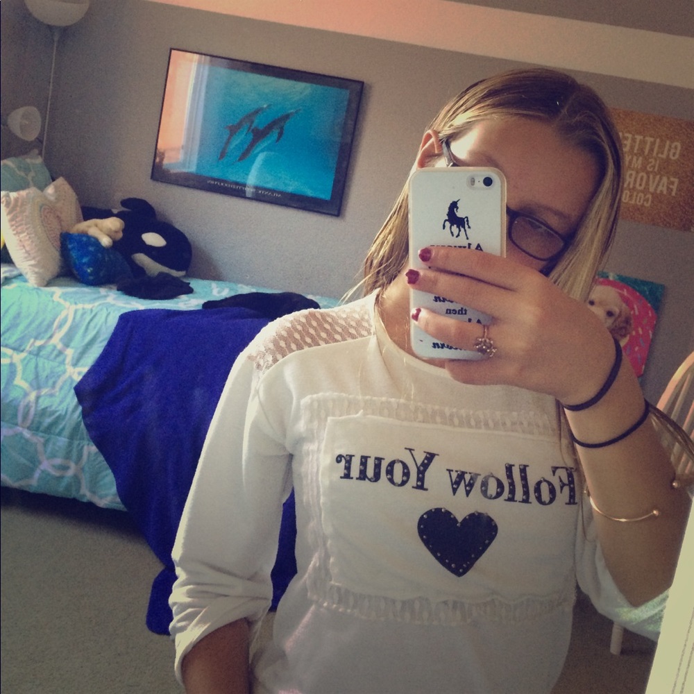 A cute white shirt with a lace shoulders!
