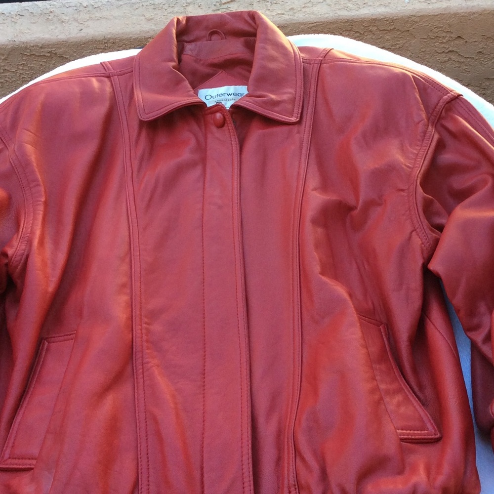 Woman’s red leather jacket