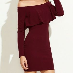 Off the shoulder burgundy dress.