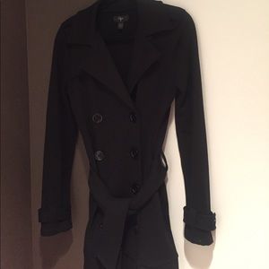 A light weight double breasted jacket with belt.