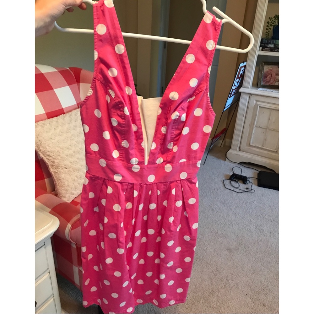 Pink and white polka dot dress.
