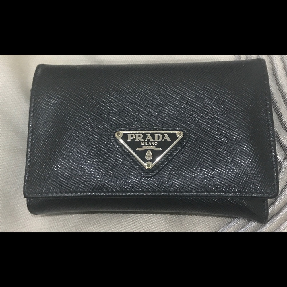 Prada wallet! Looks new! Purchased-Neiman Marcus.