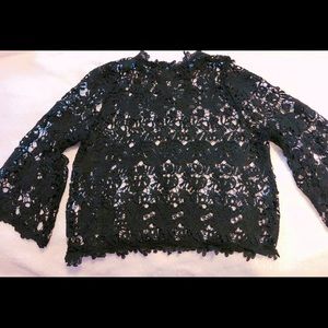 Black flute sleeve crochet top