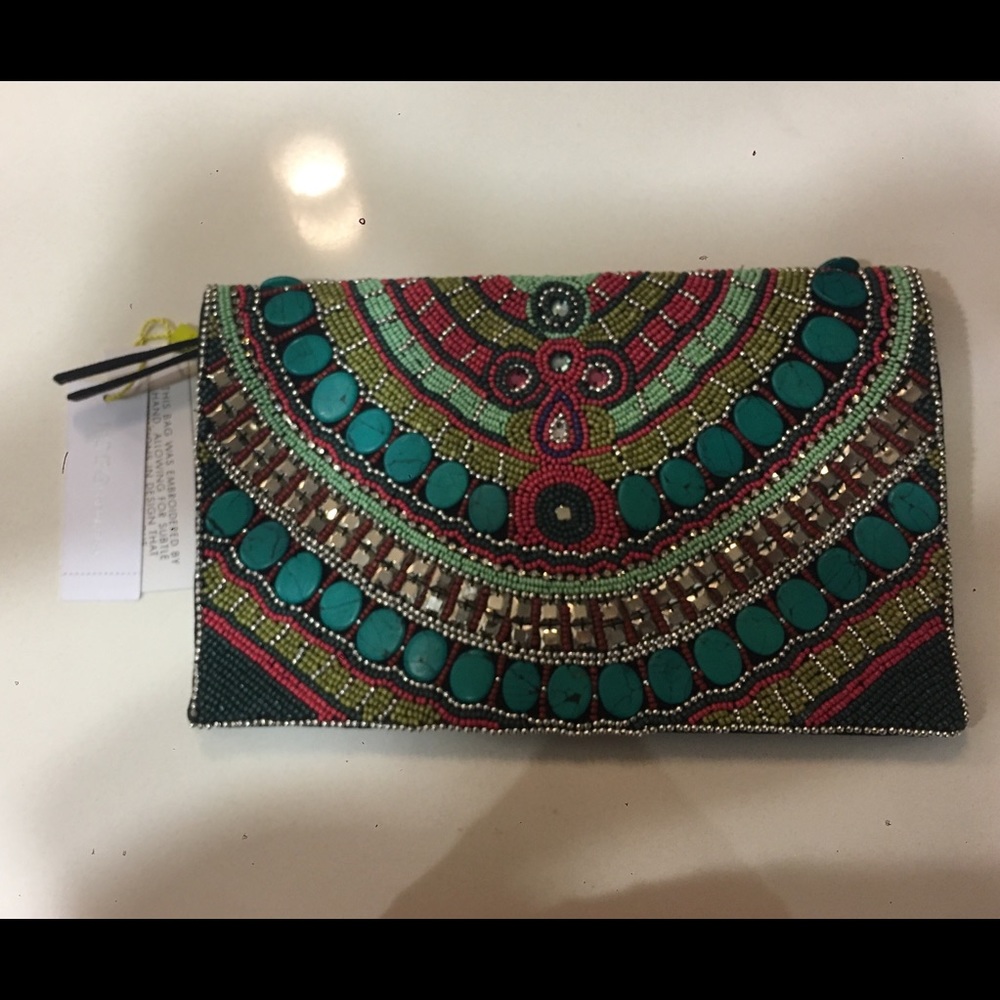 NWT BCBG hand embroidered clutch