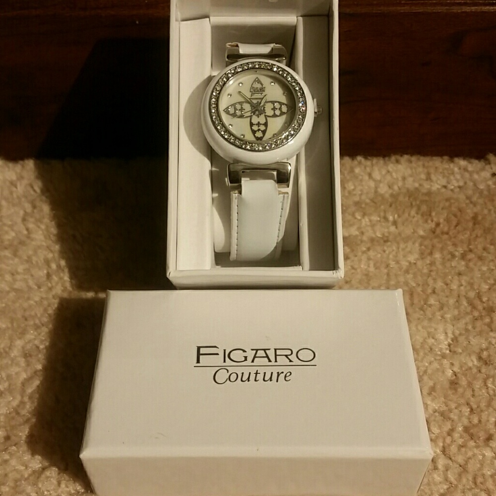 A NWT Woman's Figaro Couture rhinestones watch