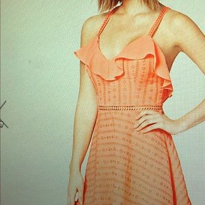NWOT bebe ruffled cross back dress