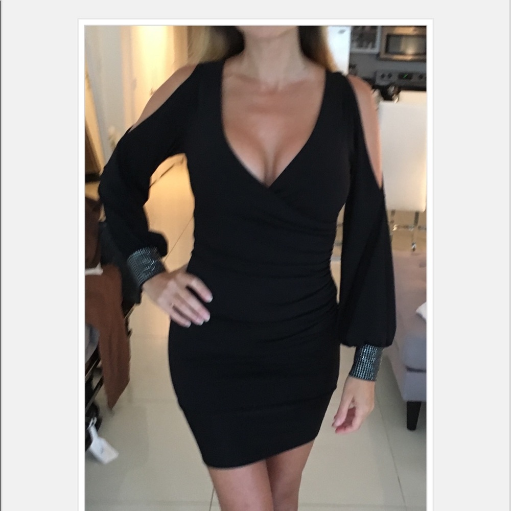 Black mini dress with rhinestone detail on cuffs