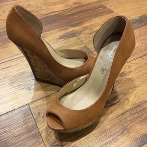 Brand new size 7 peep toe wedges
