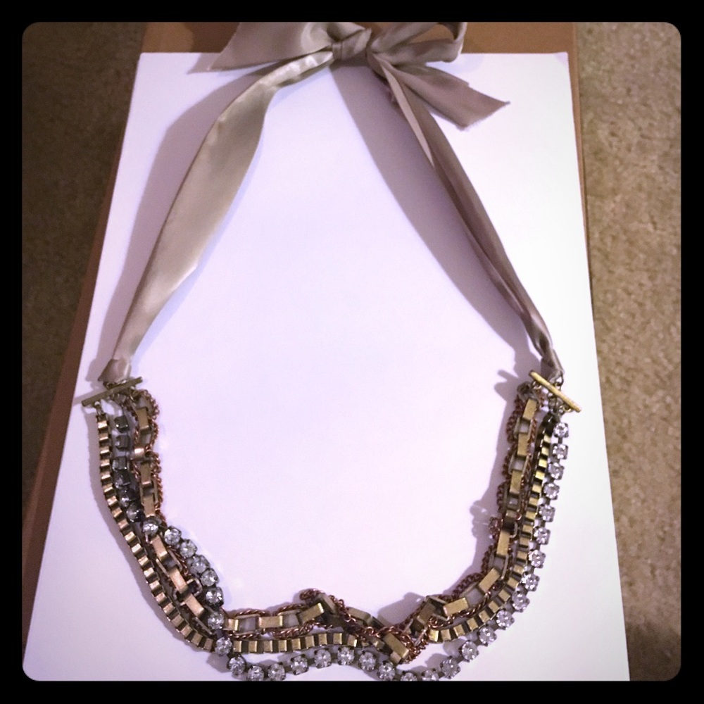 Mixed media necklace with ribbon and chains