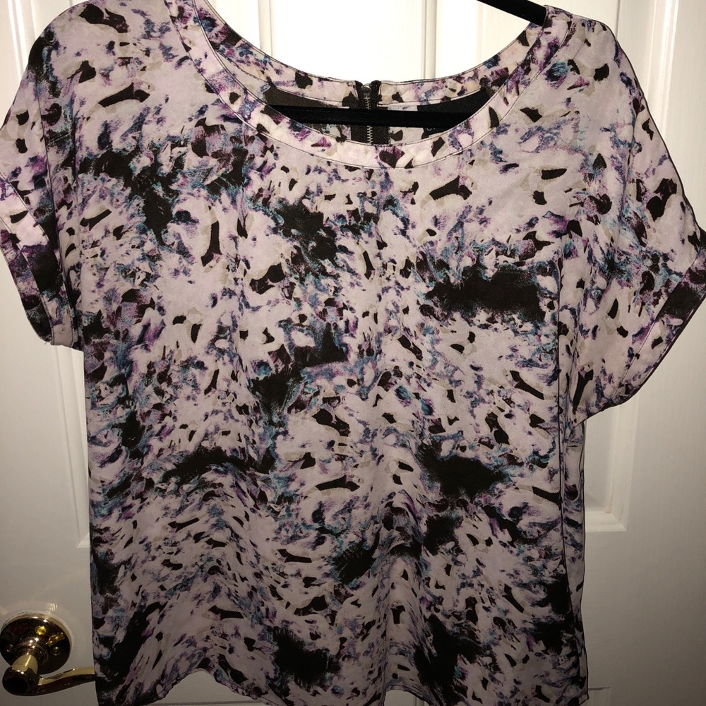 Dressy blouse with zipper in back.  Medium