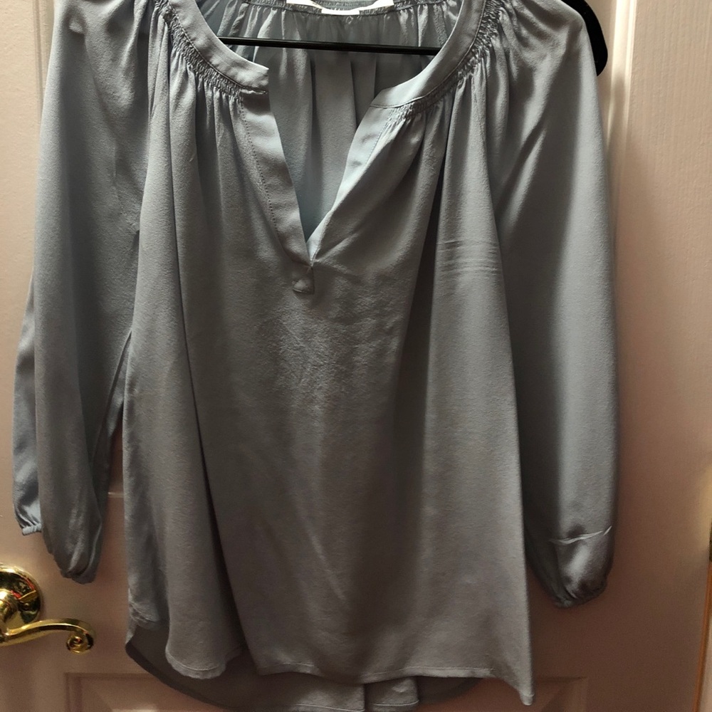 Silk top light blue. Medium