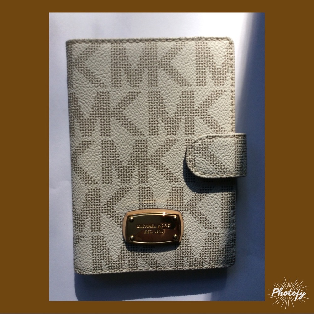 Michael kors passport authentic